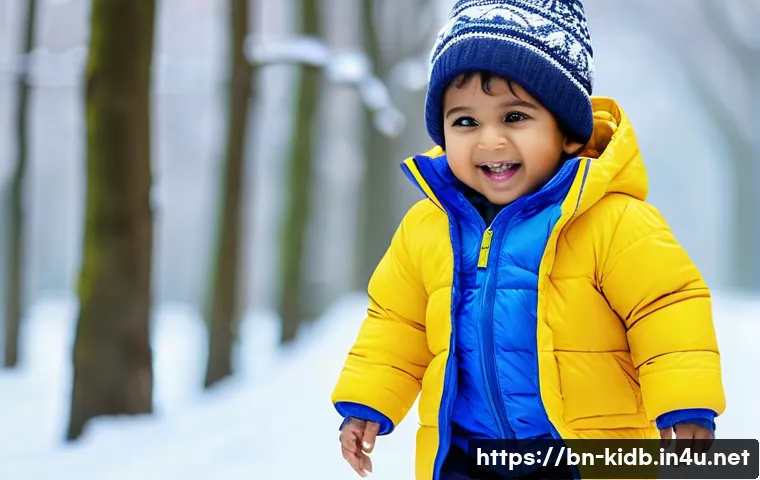 키즈 패딩 브랜드 신제품 - A cheerful Bengali toddler wearing a brightly colored lightweight padded jacket in blue and yellow, ...